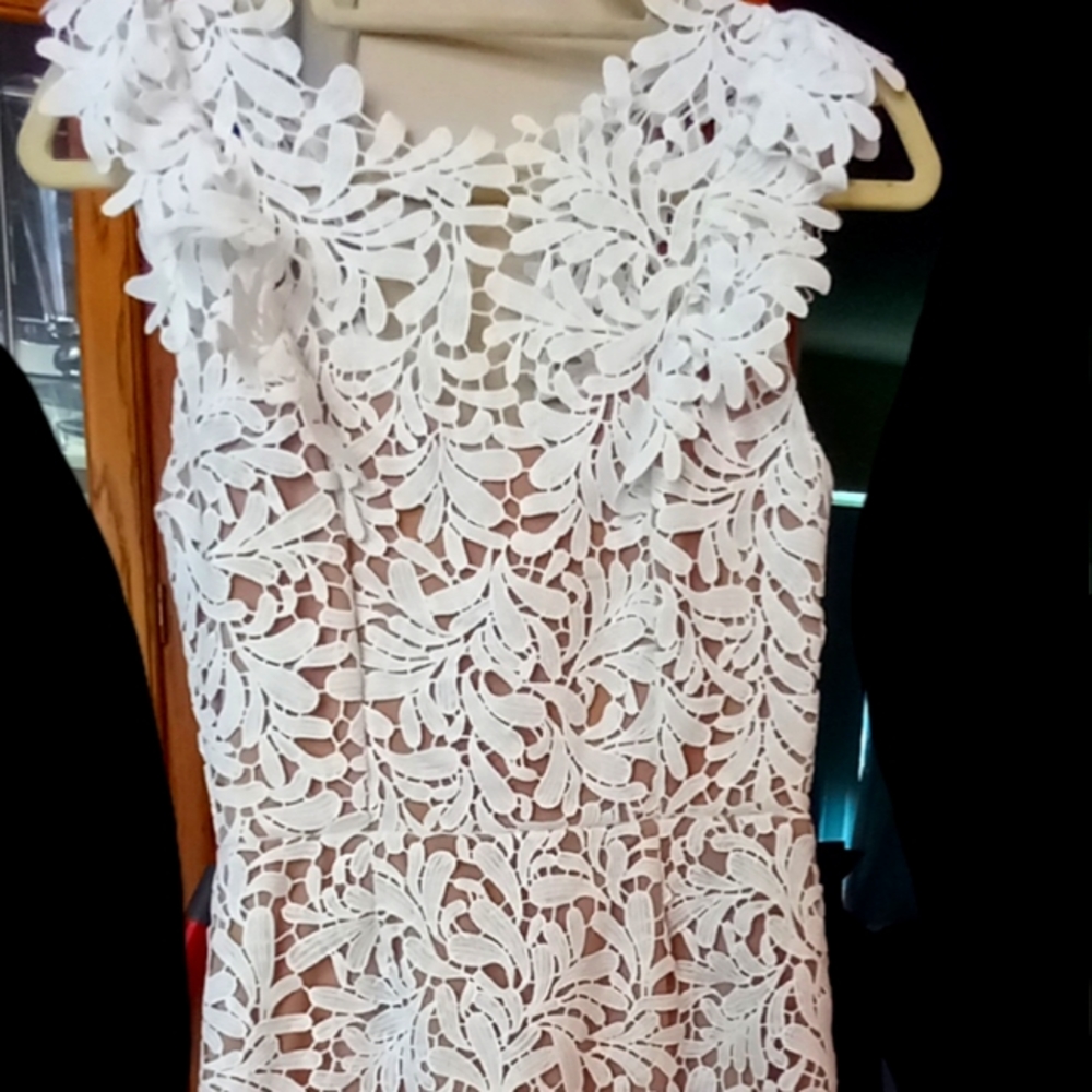 Lacey white cocktail dress.